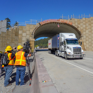 Reporters vie for a shot of the nearly-completed Keechelus Wildlife Overcrossing on I-90 east of Snoqualmie Pass. Photo: Chase Gunnell